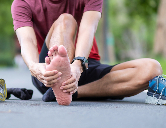 man suffering from plantar fasciitis