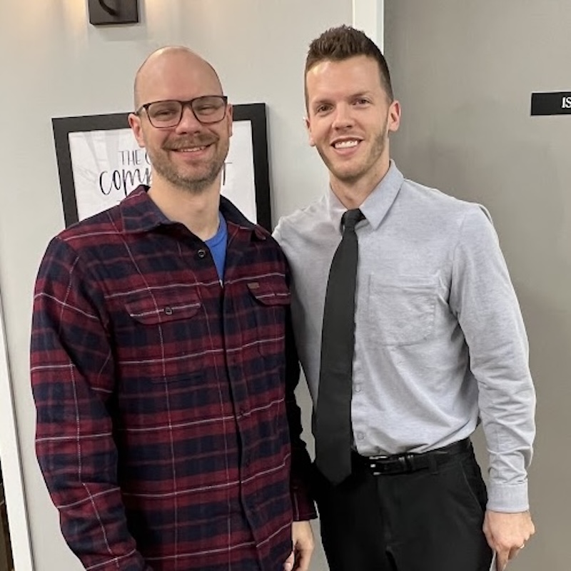 Dr. Nicholas Esser working with male patient