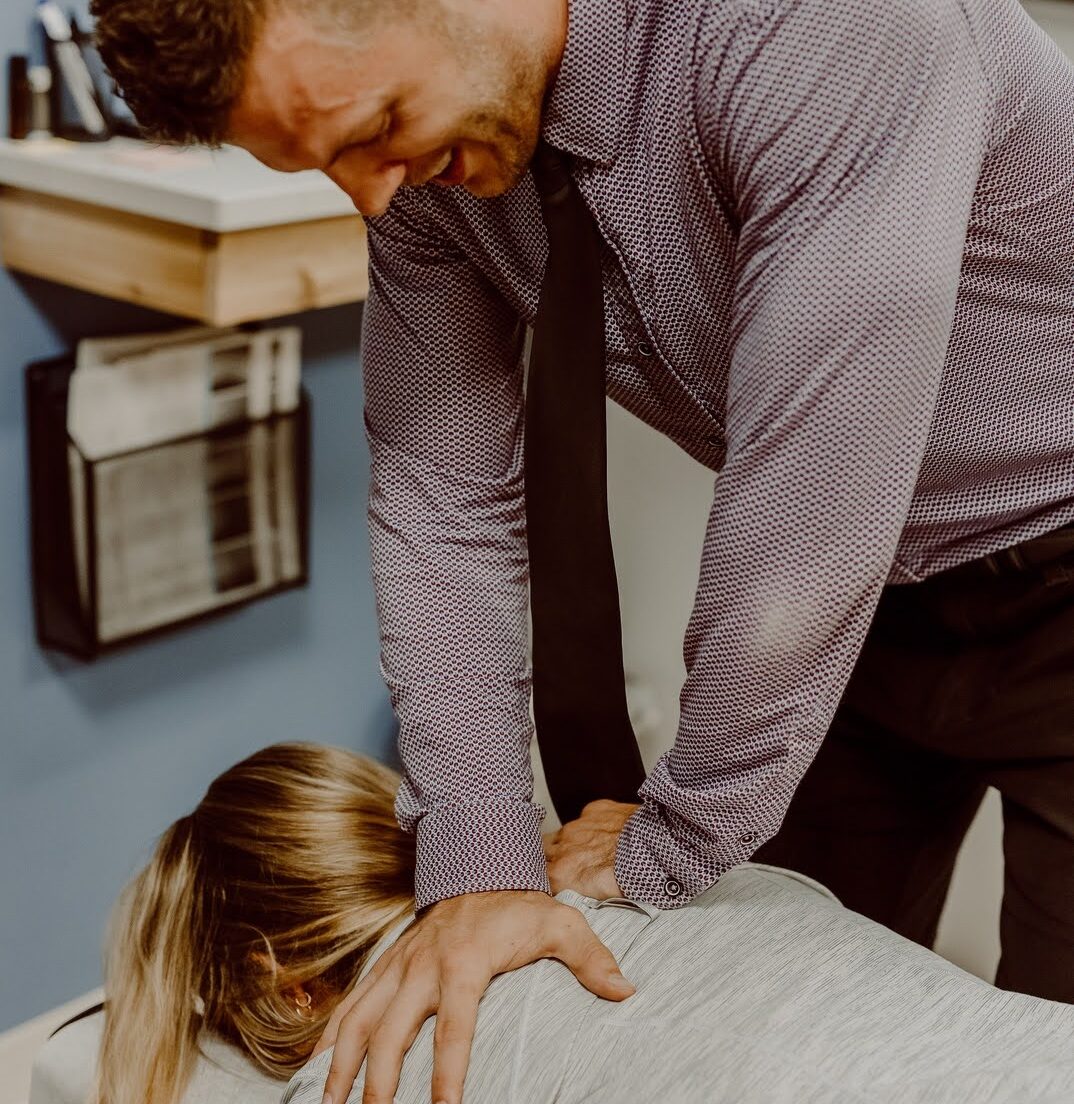 Dr. Nicholas Esser attend patients back pain treatment