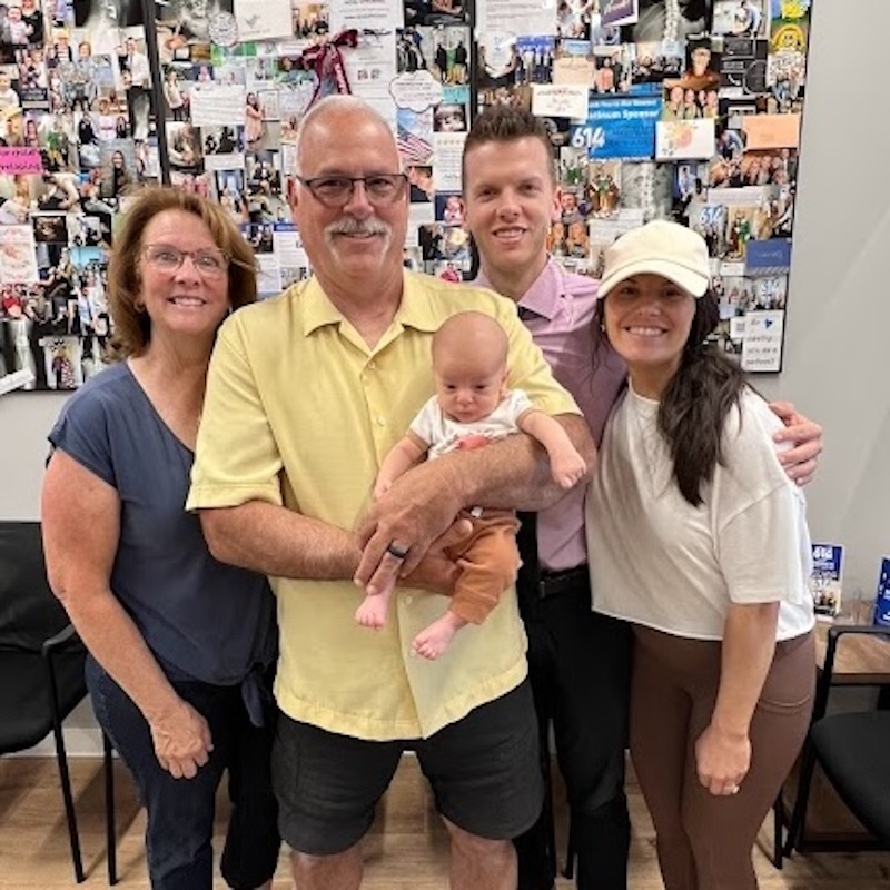 Dr. Nicholas Esser working with family patient
